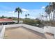 An expansive rooftop deck offers plenty of space for outdoor entertaining and stunning mountain views at 9331 E La Posada Ct, Scottsdale, AZ 85255