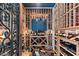 Elegant wine cellar with custom wood racking and ample storage for wine bottles and glassware at 9331 E La Posada Ct, Scottsdale, AZ 85255