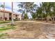 Well-maintained common area with mature trees and landscaping between residential buildings at 9345 N 92Nd St # 201, Scottsdale, AZ 85258