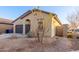 Charming home featuring a two-car garage and desert landscaping, a lovely property for any buyer at 9539 W Agora Ln, Tolleson, AZ 85353