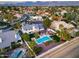 Aerial view of a home showcasing a pool, outdoor living space, and manicured landscaping at 9921 E Doubletree Ranch Rd, Scottsdale, AZ 85258