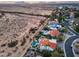 A beautiful aerial view of luxury homes with private pools bordering a scenic desert landscape at 9921 E Doubletree Ranch Rd, Scottsdale, AZ 85258