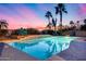 Sparkling pool with lounge chairs and palm trees, perfect for relaxing evenings and outdoor entertainment at 9921 E Doubletree Ranch Rd, Scottsdale, AZ 85258