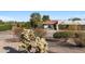 Desert home with cacti, a two car port and a private entry in a rural setting at 100 N Lazy Fox Rd # 3, Wickenburg, AZ 85390