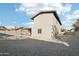 Backyard features a pool, gravel, patio, and the exterior of the house at 10252 N 46Th Dr, Glendale, AZ 85302