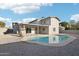 Spacious backyard featuring a private pool and well-maintained gravel area at 10252 N 46Th Dr, Glendale, AZ 85302