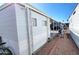 Clean and modern exterior with convenient covered parking, showcasing practicality and style at 111 S Greenfield Rd # 426, Mesa, AZ 85206