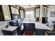 A well-equipped kitchen with black appliances, bright countertops and traditional white/black cabinetry at 111 S Greenfield Rd # 426, Mesa, AZ 85206