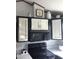 Kitchen features traditional cabinets with white faces and black trim and includes modern appliances at 111 S Greenfield Rd # 426, Mesa, AZ 85206