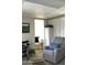 Cozy living room with a recliner and a view of the bathroom at 111 S Greenfield Rd # 426, Mesa, AZ 85206