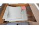 A view of a drawer in the house filled with foil and miscellaneous items at 111 S Greenfield Rd # 426, Mesa, AZ 85206