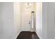 Bright entryway featuring sleek hard surface floors and neutral paint that creates an inviting atmosphere at 15764 W Shiloh Ave, Goodyear, AZ 85338