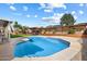 A refreshing pool with tanning deck is a great place to relax or host a party at 15764 W Shiloh Ave, Goodyear, AZ 85338
