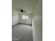 Bedroom with carpet flooring, ceiling fan and a closet at 1853 W Burgess Ln, Phoenix, AZ 85041