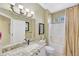 Bathroom with granite vanity and shower-tub combination at 20462 N Ridgewood Ln, Surprise, AZ 85374