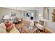 Open living and dining area with hardwood flooring and a cozy seating arrangement at 20462 N Ridgewood Ln, Surprise, AZ 85374