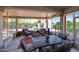 Inviting patio with a cozy seating arrangement and serene outdoor vistas at 20462 N Ridgewood Ln, Surprise, AZ 85374