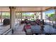Relaxing enclosed patio featuring comfortable seating and lush garden views at 20462 N Ridgewood Ln, Surprise, AZ 85374