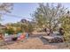 Inviting backyard with a fire pit, lounge chairs, and picturesque mountain backdrop at 2409 N 57Th St, Scottsdale, AZ 85257