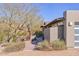 Home with side yard, landscaping, brick retaining wall, and desert view at 2409 N 57Th St, Scottsdale, AZ 85257