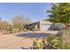 Home with large garage, desert landscaping, and a desert view at 2409 N 57Th St, Scottsdale, AZ 85257