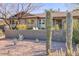 Well-maintained desert landscaping surrounds the home at 2409 N 57Th St, Scottsdale, AZ 85257