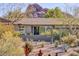 Single story home featuring desert landscaping and mountain views at 2409 N 57Th St, Scottsdale, AZ 85257
