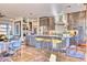 Modern kitchen features stainless steel appliances, an island with bar seating, and plenty of cabinet space at 2409 N 57Th St, Scottsdale, AZ 85257