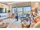 Bright and open living room with large sliding glass doors to the backyard at 2409 N 57Th St, Scottsdale, AZ 85257