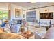 Cozy living room features a fireplace, comfortable seating, and stylish decor at 2409 N 57Th St, Scottsdale, AZ 85257