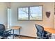 Bright office space with dual desks, perfect for productivity and collaboration at 2409 N 57Th St, Scottsdale, AZ 85257