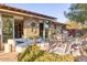 Stylish outdoor patio with comfortable seating and a modern dining area at 2409 N 57Th St, Scottsdale, AZ 85257