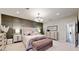 Comfortable main bedroom featuring decorative wall, chandelier lighting, and a neutral color palette at 2410 E Cholla St, Phoenix, AZ 85028