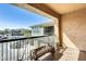 Outdoor patio area with decorative wheelbarrow and neighborhood views at 2425 W Bronco Butte Trl # 2008, Phoenix, AZ 85085