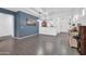 Bright dining area featuring tile floors, an open layout, and stylish decor at 26065 W Yukon Dr, Buckeye, AZ 85396