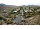 Scenic aerial shot showcasing a residential area with desert landscaping and a network of roads at 3501 E Dunlap Ave, Phoenix, AZ 85028