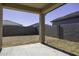 Backyard with patio and block wall at 38197 W San Clemente St, Maricopa, AZ 85138