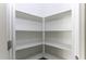 Well-organized pantry with ample shelving, providing generous storage space for all your needs at 38197 W San Clemente St, Maricopa, AZ 85138