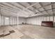 Unfinished basement with white walls and potential for customization at 407 E Eason Ave, Buckeye, AZ 85326