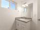 Bathroom featuring vanity with granite countertop and sink at 407 E Eason Ave, Buckeye, AZ 85326