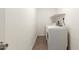 Bright laundry room featuring a modern washer and dryer at 407 E Eason Ave, Buckeye, AZ 85326