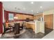 Spacious kitchen with stainless steel appliances, ample cabinet space, and a breakfast nook with seating at 4429 W Paseo Way, Laveen, AZ 85339