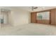 Spacious living room with neutral carpet, lots of natural light and neutral paint is ready for your personal touches at 4429 W Paseo Way, Laveen, AZ 85339