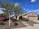 Charming single-story home featuring desert landscaping and a welcoming entrance at 6834 W Morning Vista Dr, Peoria, AZ 85383