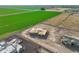 Aerial view of new home surrounded by farmland and other newly constructed homes at 7259 S 221St Ave, Buckeye, AZ 85326