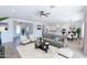 Bright living room featuring an open-concept layout, modern furnishings, and plenty of natural light at 7271 S 221St Ave, Buckeye, AZ 85326