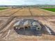 Aerial view of a home under construction in a new community, showcasing its modern design and setting at 7283 S 221St Ave, Buckeye, AZ 85326