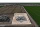 A captivating aerial view of a one-acre home lot amid sprawling farmland at 7295 S 221St Ave, Buckeye, AZ 85326