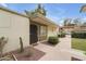 Exterior view of unit showing desert landscaping with a covered front porch entry at 7740 E Heatherbrae Ave # 5, Scottsdale, AZ 85251