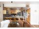 Bright eat-in kitchen features stainless appliances, a gray countertop, and modern lighting at 7740 E Heatherbrae Ave # 5, Scottsdale, AZ 85251